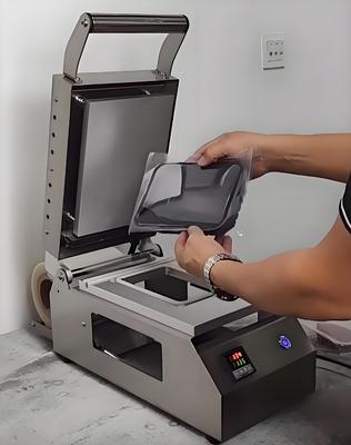 Small Portable Plastic Material Container Sealer Heat Meal Food Tray Sealer Machine DQ-3 For Food Tray Packing Manual Tray Sealing Machine Compact Design for Food Packaging